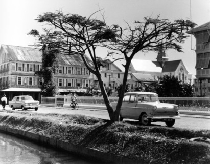 Main street of Georgetown, British Guiana. The main street of Georgetown, featuring a canal in the