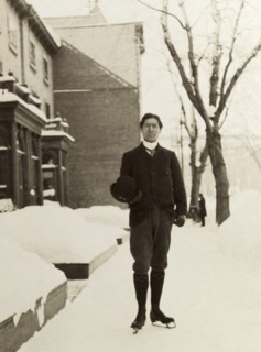 Mr Meagher ice skating, Montreal. Full-length portrait of Mr Meagher, who pauses for the camera