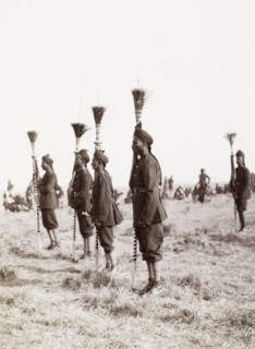 Spearmen at Coronation Durbar, 1903. Uniformed spearmen stand to attention holding ceremonial