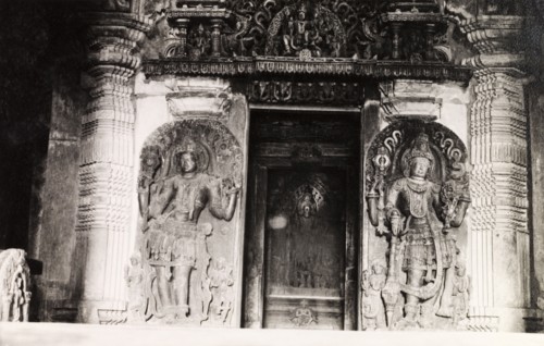 Sculptures at Chennakesava Temple. Two ornately sculpted 'doorkeepers' flank an image of Kesava