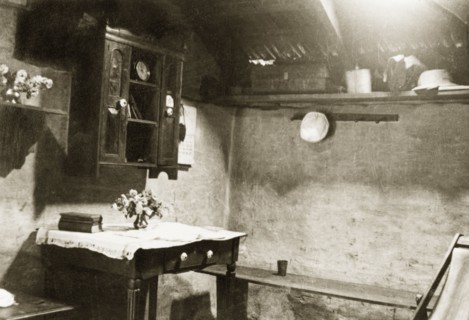 Estate house prepared for Holy Communion. The interior of an estate house laid out for British