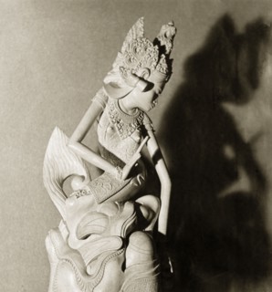 A Hindu figurine from Bali. A intricately carved figurine of a Hindu deity or 'devi' (goddess).