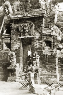 A traditional Balinese dance. A Balinese woman dressed in an elaborate costume performs a