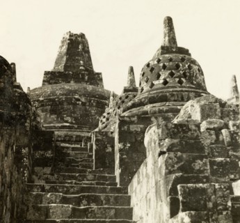 Stupas at the top of Borobudur. View of the domed peak of Borobudur, a ninth century Buddhist