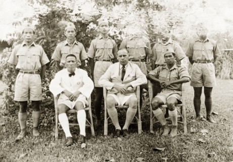 Trainee health officers at Keningau Health Centre. Group portrait of British medical officer Dr