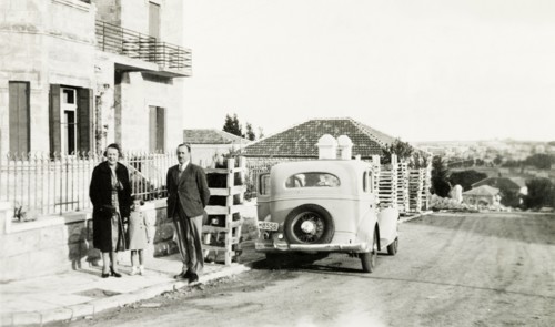 The Jones family in Jerusalem . The British Jones family stand on the pavement outside a house in