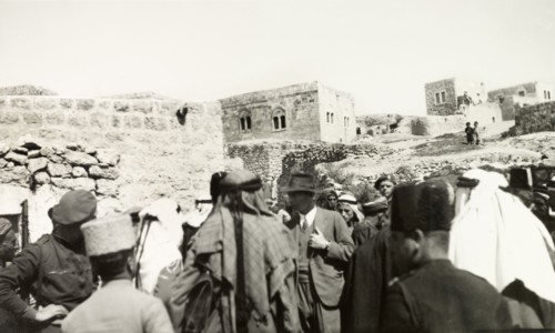 Tax collection in Idna. A British government official collects taxes in the Arab village of Idna.
