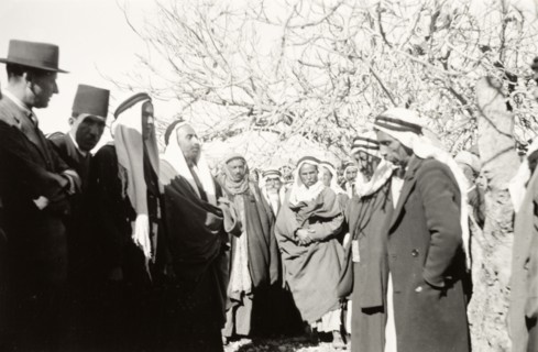 William Ryder McGeagh talks to Arab villagers. William Ryder McGeagh (left), District Commissioner