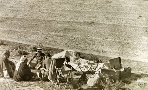 A travelling party in Al-Masfara. A party of travellers stops for lunch during a journey through