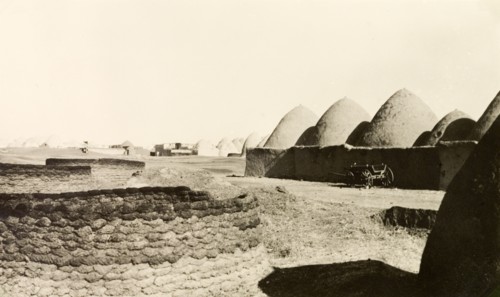 Bedouin mud dwellings near Aleppo. A Bedouin village near Aleppo, containing a number of