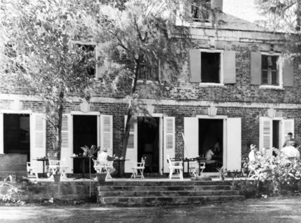 The Admiral's Inn, Antigua. The louvered doors of the historic Admiral's Inn open out onto a stone