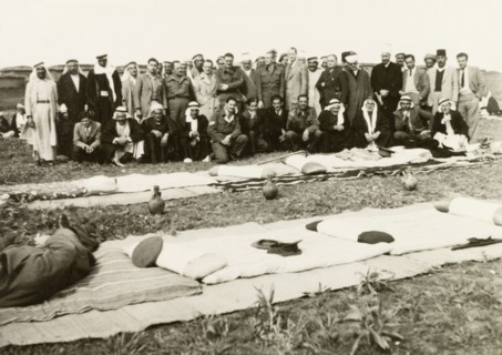 Recruitment meeting at Al Faluja. British colonial and military officers pose for a group portrait