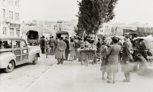 Leaving Jerusalem, April 1948. Palestinian Arabs from the residential district of Qatamon gather on