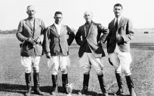 Winning polo players at Bareilly. Portrait of four male polo players after winning the Bareilly