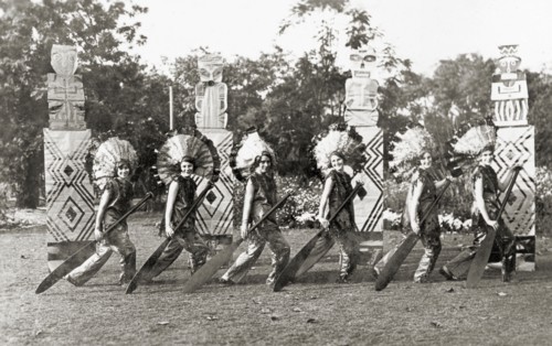 Chorus line act at a garden party. Members of the cast of 'Flying Fragments' performed by the