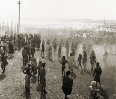 Triveni Sagam at the Ardh Kumbh Mela. Thousands of Hindu pilgrims descend on the Triveni Sangam
