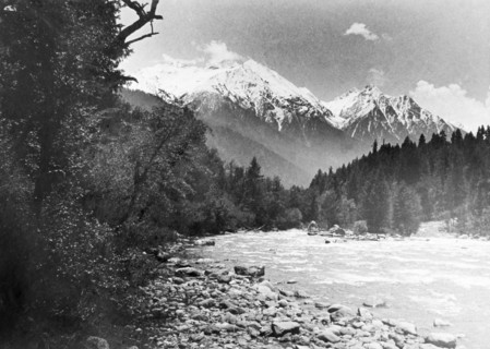 Sheshnag Mountain from the Pahalgam Valley. The snow-capped peaks of Sheshnag Mountain rise up