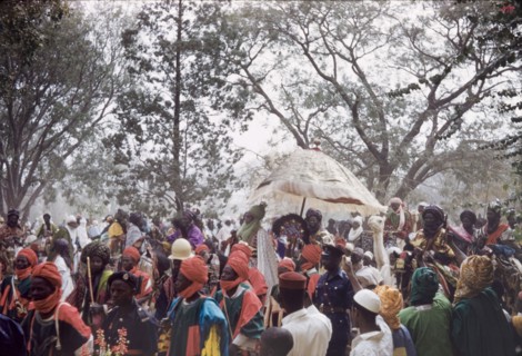 The Emir of Kano in a Sallah parade. The new Emir of Kano, Alhaji Ado Bayero, rides to the
