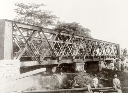 Building a railway bridge near the Caroni River. Construction workers build a 24-metre railway