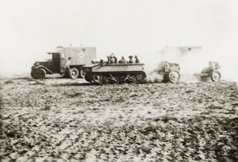 British medical trucks and tanks in Palestine. Ambulance trucks of the Royal Army Medical Corps and