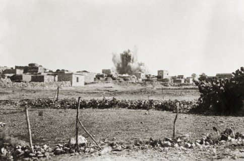 Demolition of a Palestinian house. An explosion rips through a Palestinian village as a house is