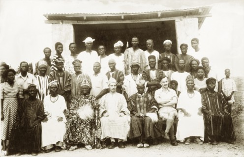 Imesi Progressive Union. British colonial officer Cyril Iles sits proudly at the centre of a group