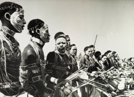 Tanganyikan dancers in ceremonial attire. Official publicity shot for the Tanganyikan government