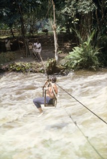Elisabeth Lang Brown crosses to Kyantsore Island. Elisabeth, the wife of District Forestry Officer