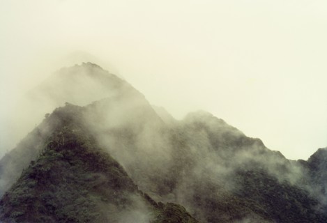 Mount Sabinyo in cloud. The summit of Mount Sabyinyo (Sabinio) enshrouded by clouds. Kigezi, South
