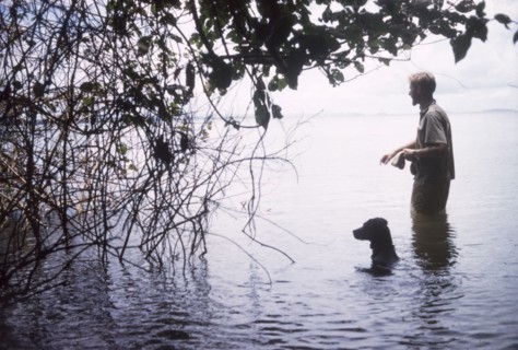 Beware of hippo'. Accompanied by his dog, District Forest Officer James Lang Brown wades