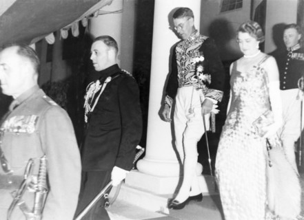 At an investiture at Government House. Sir Maurice Hallett, governor of the United Provinces, and