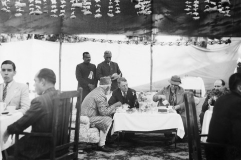Taking tea with Sir Maurice Hallett. Reception at Jansath near Muzzaffarnagar. Seated centre left