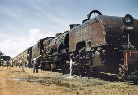 East African Railways train on the Uganda Railway. Passengers board an East African Railways train