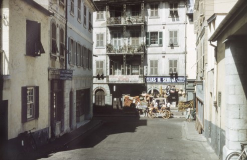 A street in Gibraltar. A horse-drawn carriage travels along a city street in Gibraltar. Gibraltar,