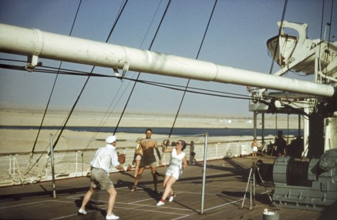 Deck games on the Kenya Castle. Three friends play deck quoits on the Kenya Castle, a passenger