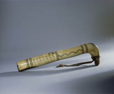 Adze or scraper handle incised with a row of American soldiers