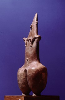 A mother goddess / fertility figure with emphasized hips and navel