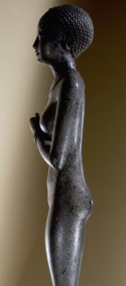 Statuette of a woman with the cartouche of Necho II embossed on the upper arms