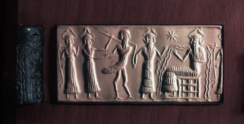 Cylinder seal of the water god Ea with streams flowing from his body