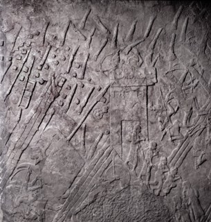 Stone relief from the palace of Sennacherib, depicting the assault on the gate tower of Lachish