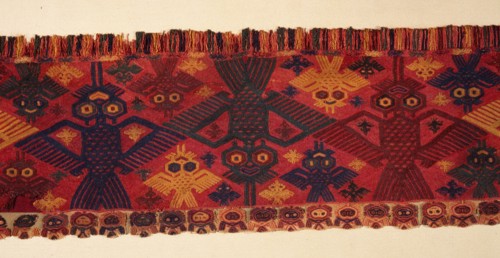 Border of a textile with humming birds