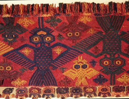 Border of a textile with humming birds