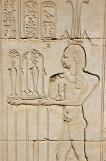 Carved relief on the outer wall of the structure which houses the Hall of the Ennead and The Sanctuary
