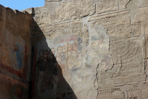 Wall reliefs from the period of Amenhotep III plastered over during Roman times with colourful images of Roman Emperors prior to the conversion into a Christian Chapel
