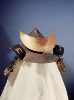 Helmet with torii design in gold