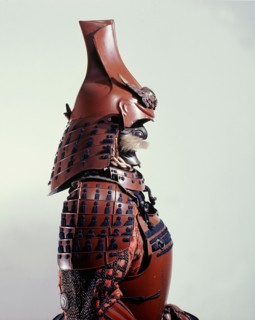 This suit of armour bears a Buddhist gold lacquer inscription on the breastplate