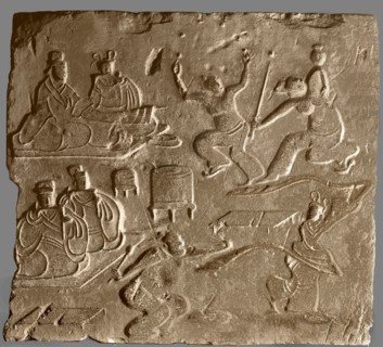 Brick from a tomb structure impressed with scenes of entertainment