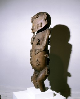 Unique sculpture representing Tangaroa, creator and sea god of Polynesia, in the act of creating the other gods and men, seen on the surface of his face and body