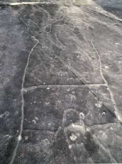 Petroglyph incised in the rock at an aboriginal sacred site