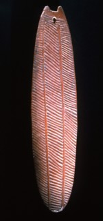 An incised wood sacred board from Western Australia